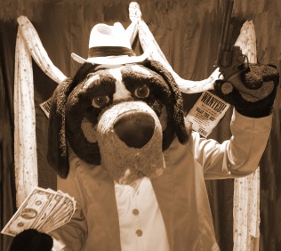 Smokey posing for old-timey photo as if he robbed a bank